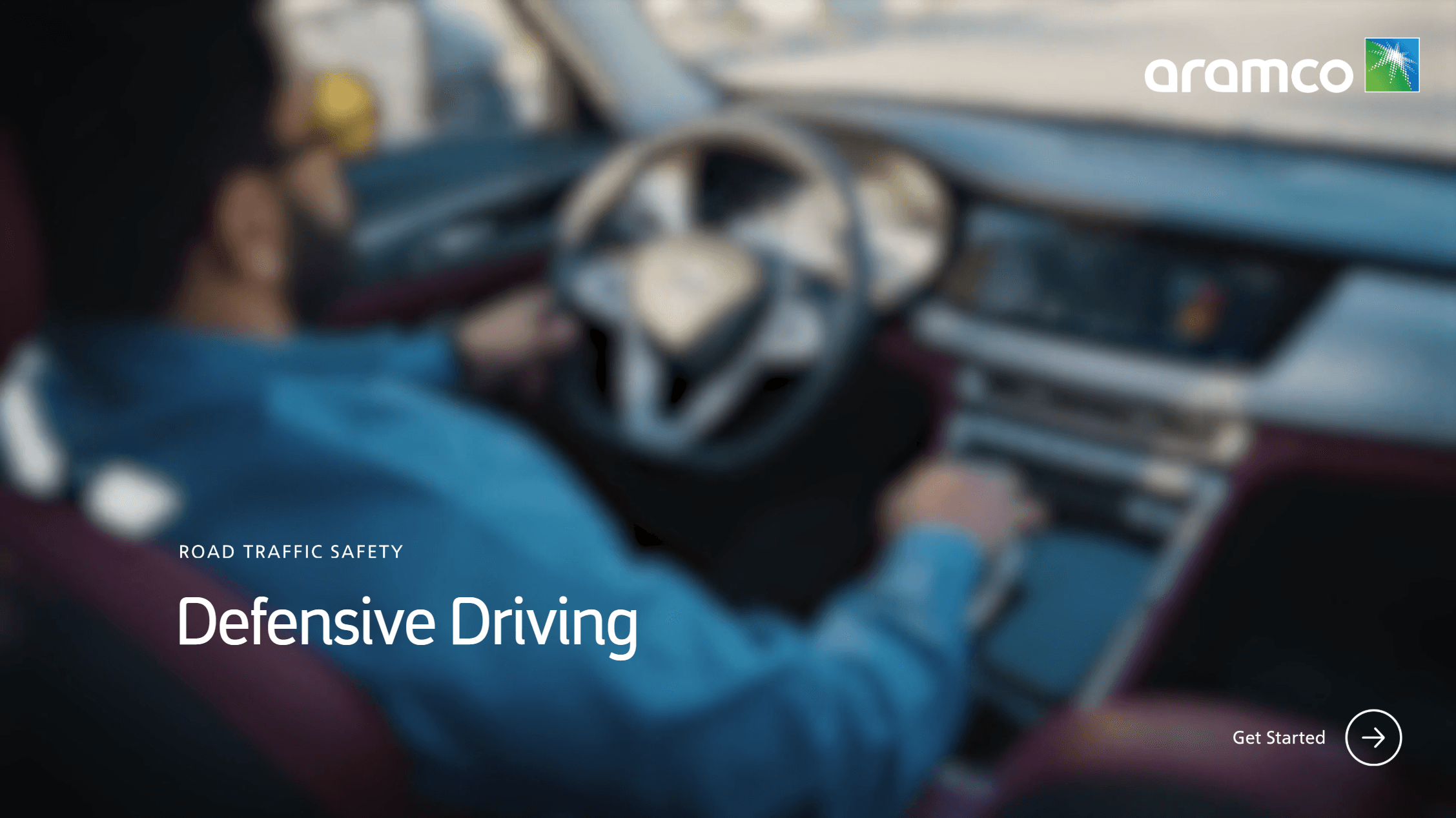 Course title slide: Road Traffic Safety — Defensive Driving, over a driver at the wheel, with the Aramco logo.